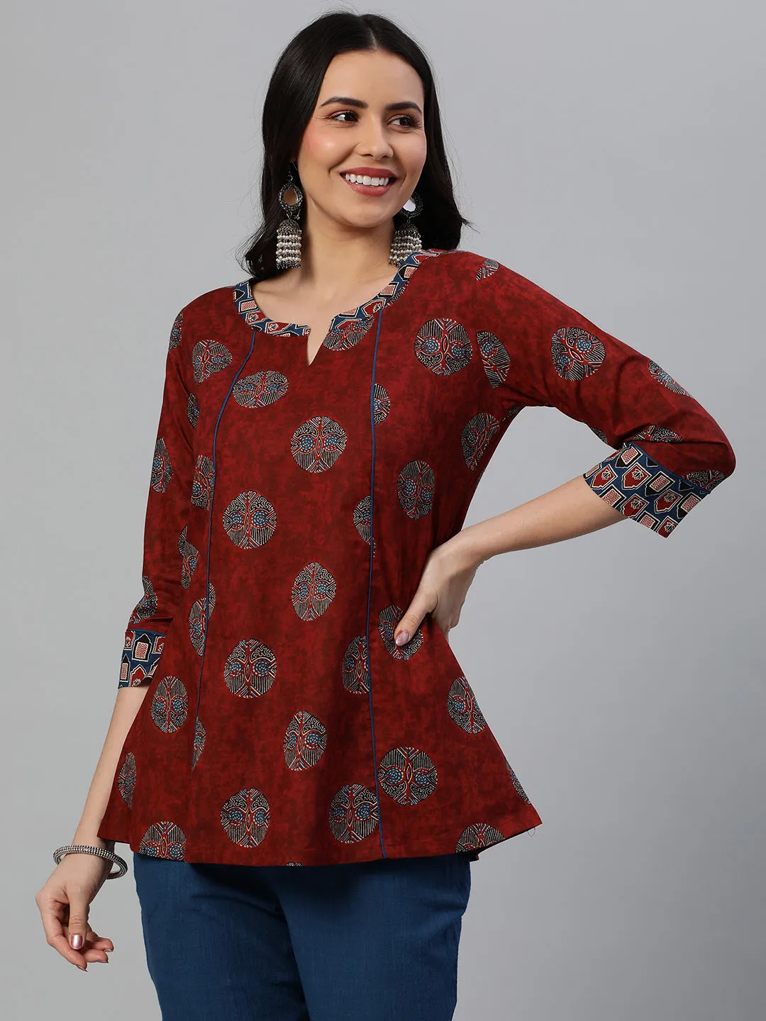 Khoobsurat - A flared tunic with slit and printed collar and sleeve cuff.