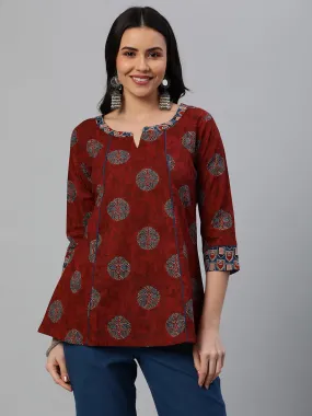 Khoobsurat - A flared tunic with slit and printed collar and sleeve cuff.