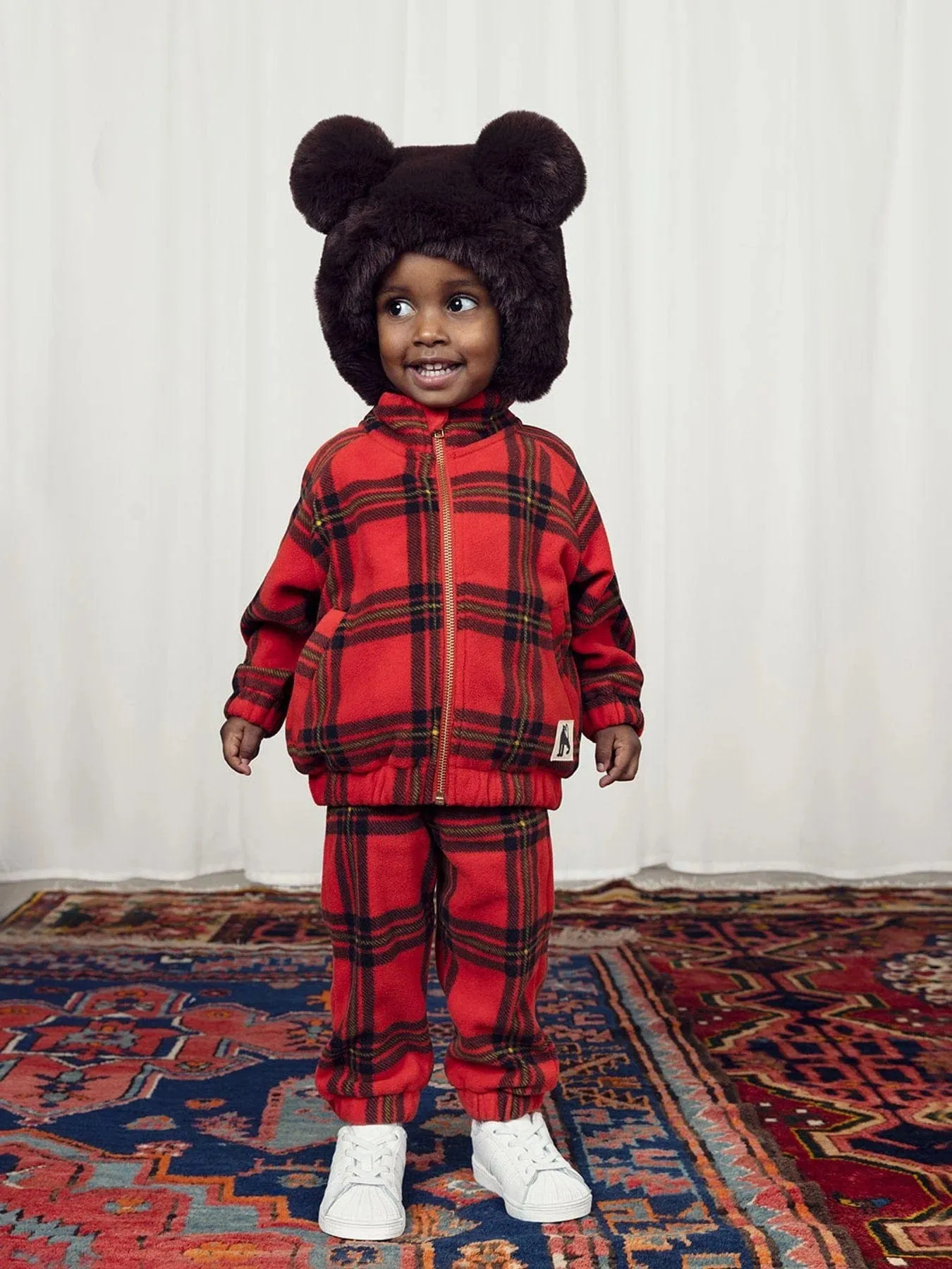 Mini Rodini Kids Check AOP Fleece Joggers in Red